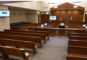 Attorney Andi Geloo inside Virginia courtroom ready for trial
