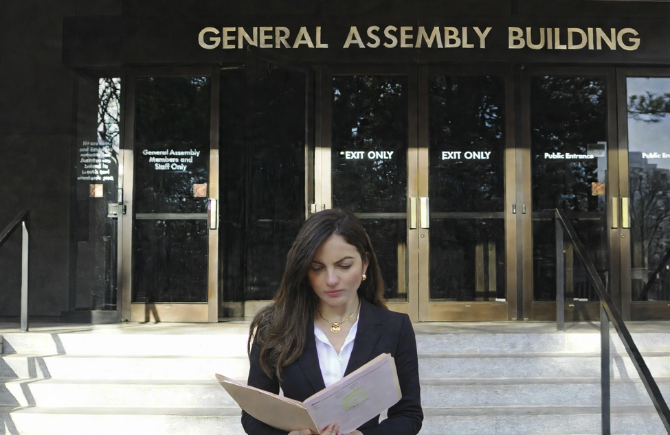 Andi Geloo at the Virginia General Assembly after the passage of the statute that carries her name